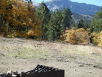 Campfire pit in Table Mountain Campground with Mt Baden Powell in background - Wrightwood CA Camping