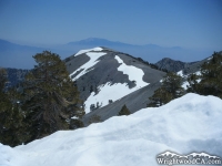 Viewing south from North Backbone Trail on Mt Baldy with snow covering the trail.  Mt San Jacinto seen in the background. - Wrightwood CA Mountains