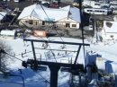 Looking down at the Angeles Crest Cafe from the Mountain High Express chair lift at Mt High East Resort. - Wrightwood CA Photos