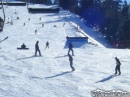 Skiiers and Snowboarders coming down Goldrush toward the top of the East Resort at Mt High. - Wrightwood CA Photos