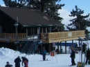 Skiiers and Snowboarders in front of the Grand View Bistro at Mt High East. - Wrightwood CA Photos