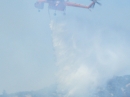 Helicopter dumping water below Circle Mountain during Sheep Fire. - Wrightwood CA Photos